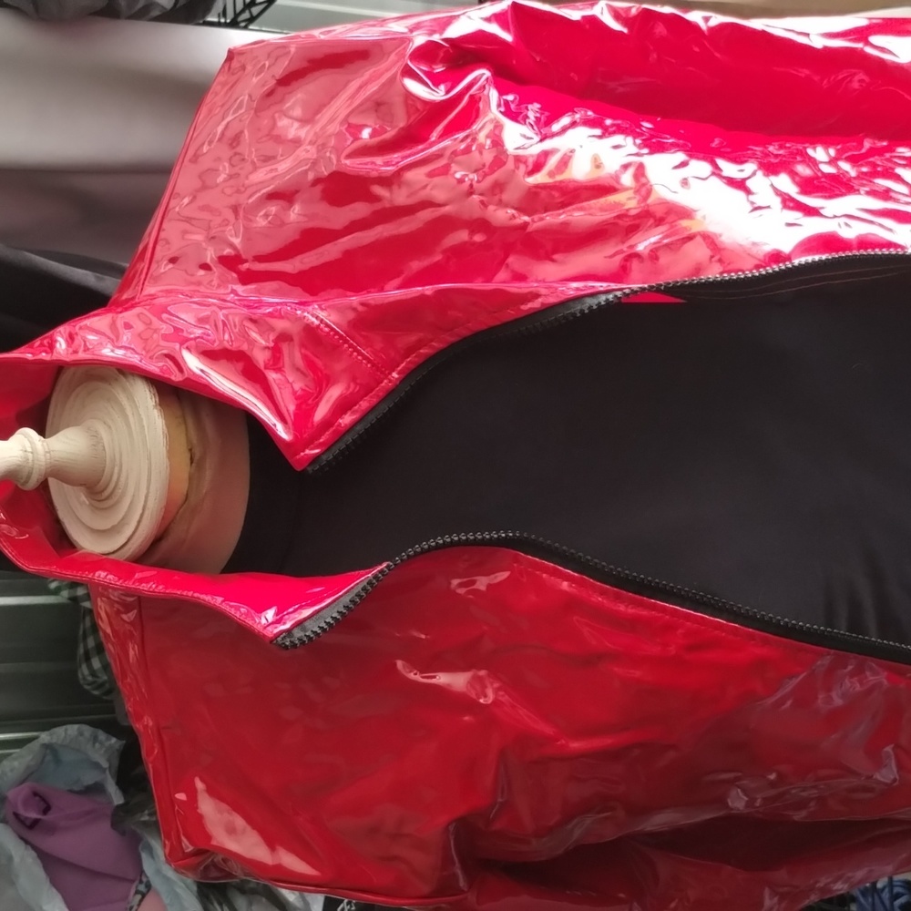 Red shiny rain coat